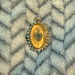 Virgin saints and angels pendant